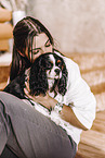 young woman with Cavalier King Charles Spaniel