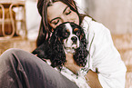 young woman with Cavalier King Charles Spaniel