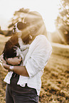 young woman with Cavalier King Charles Spaniel