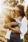 young woman with Cavalier King Charles Spaniel