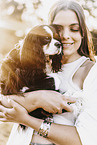 young woman with Cavalier King Charles Spaniel