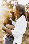 young woman with Cavalier King Charles Spaniel