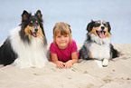 girl with Australian Shepherd and Collie