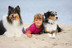 girl with Australian Shepherd and Collie