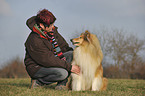 woman and longhaired collie