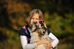 girl and longhaired Collie