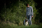 man and longhaired Collie