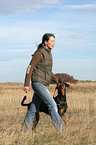woman with Doberman Pinscher