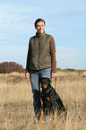 woman with Doberman Pinscher
