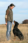 woman with Doberman Pinscher