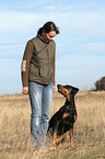 woman with Doberman Pinscher