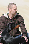 man with Doberman