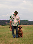man training Bordeauxdog