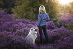 woman with Eurasian Dog