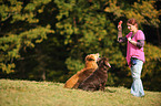woman with 2 dogs