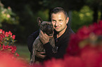 man with French Bulldog