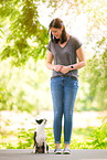 woman and French Bulldog