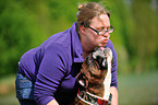 woman and German Boxer