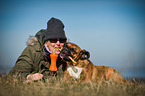woman and German Boxer