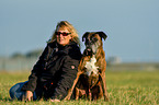 woman and German Boxer