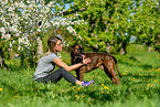 woman with German Boxer