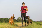 woman with German Boxer