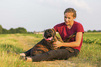 woman with German Boxer