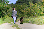 woman and German Boxer