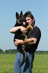 man and German Shepherd