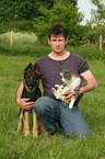 man with dog and cat
