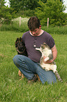 man with dog and cat