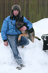 man and German Shepherd