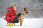 woman and German Shepherd