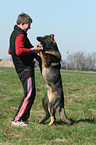 man and German Shepherd