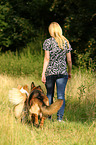 woman and 2 dogs