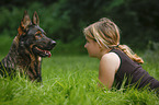 woman and German Shepherd GDR