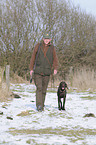 huntsman with German shorthaired Pointer