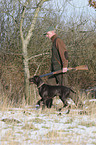 huntsman with German shorthaired Pointer