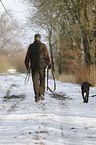 huntsman with German shorthaired Pointer