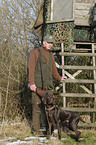 huntsman with German shorthaired Pointer