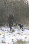 huntsman with German shorthaired Pointer