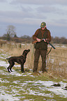 huntsman with German shorthaired Pointer