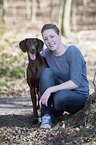 woman and German shorthaired Pointer