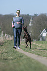 woman and German shorthaired Pointer