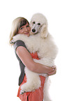 woman with standard poodle