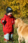golden retriever and child