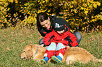 golden retriever and child