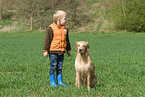 boy and golden retriever