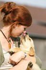 woman with Golden Retriever Puppy