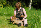 woman with puppies